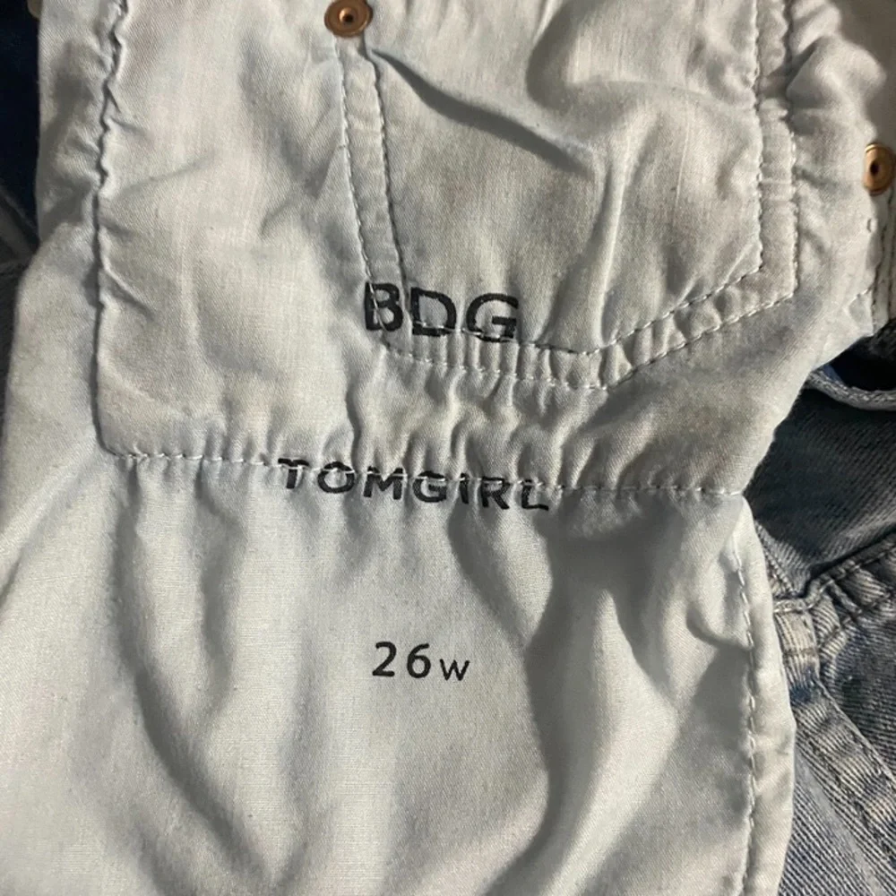 BDG High Rise Button Fly Distressed & Patched Tomgirl Jean Shorts
